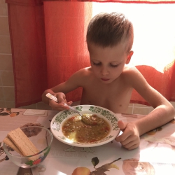 Egor is tasting his soup, Sochi, 2019